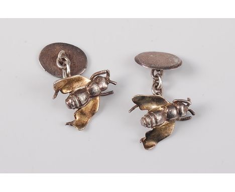 A pair of silver gilt fly cufflinks, the naturalistically styled fly's with gilt wings and silver bodies, with Sheffield impo