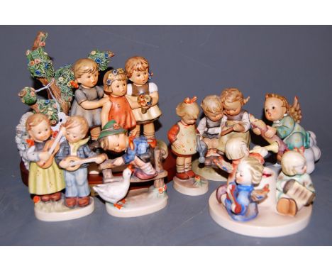 Seven various Hummel figures, to include Beautiful Serenade, with stand from the 2002 Preview Edition    Condition Report / E