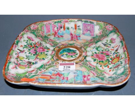 A 19th century Chinese Canton enamel decorated shaped square dish, heightened in gilt (restored)