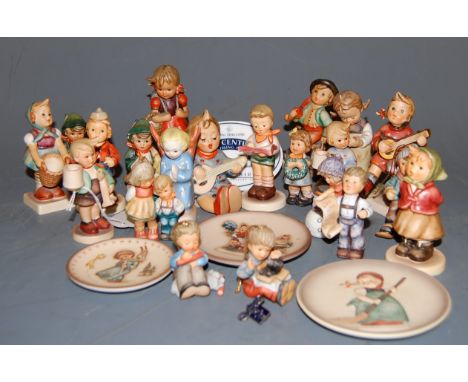 A quantity of principally small Hummel figures, plates etc    Condition Report / Extra Information  Seated boy figure  - bud 