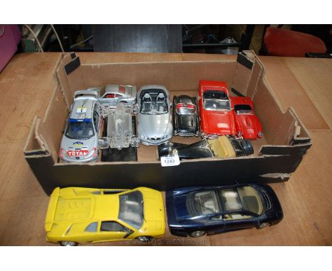 Ten die cast model Cars (mostly 1/18 or 1/24 scales) including Jaguar, Ferrari, Lamborghini, Ford Mustang, Peugeot 206 (rally