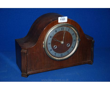 A circa 1930's Mahogany cased mantle Clock having dome top case with moulded canted corners and bracket feet, circular chrome