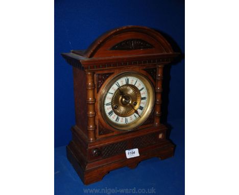 A European late 19th c. architectural Mantle Clock, having moulded pediment top over applied half turned bamboo style moulded