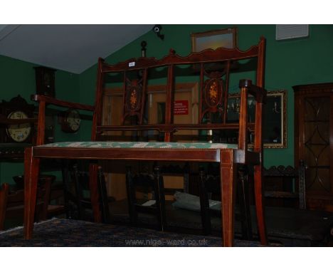 An Edwardian Mahogany salon Sofa with twin chair back style back, pierced fret cut inlaid splats and scroll arms, applied gre