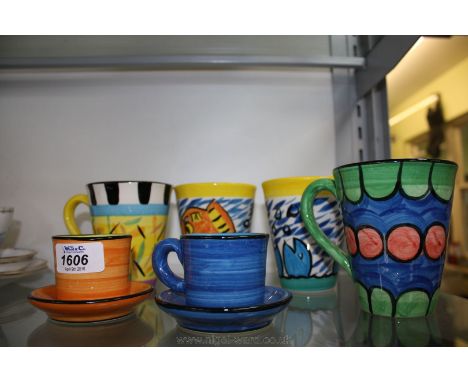 Two bold colour Beakers, two mugs and two espresso cups and saucers, by Reckless.