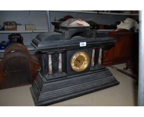 A late 19th c. black Slate and Marble large architectural Mantle Clock, having marble pediment to the shaped top, circular br