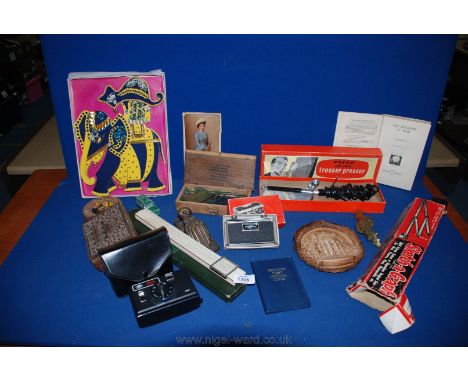 A box of miscellanea including slide rule, brass pharmaceutical scales in a wooden box, trouser Press and a wooden box contai