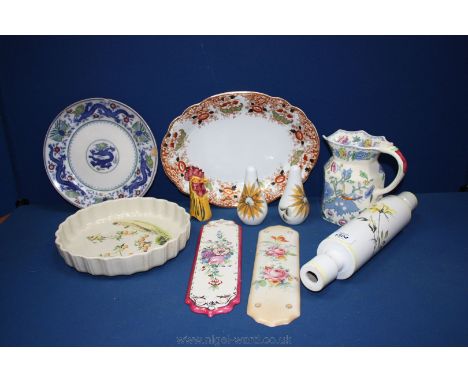 A quantity of china including Masons jug a/f, a Wade flan dish, pie funnel, rolling pin, door guards and cruet