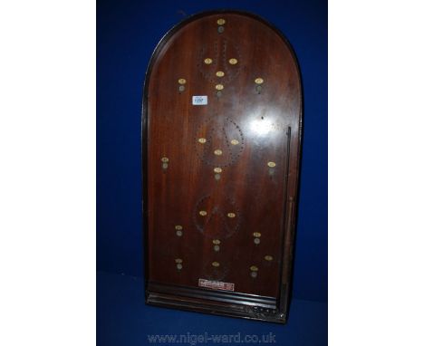 A Corinthian 21T tournament model Bagatelle board (full size), includes cue and ball bearing.