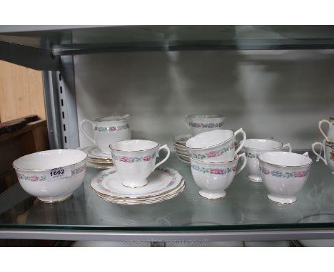 A Royal Albert floral Teaset including six cups, saucers and tea plates, milk jug, sugar bowl and cake plate.