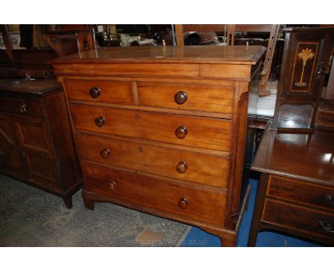 A good mid 19th c. Walnut Chest of two short over three long graduated Drawers having moulded edge top and canted corner base