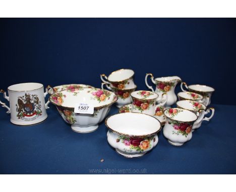 A small quantity of Royal Albert 'Old Country Roses' china including teacups, coffee cups and saucers, bowl, etc., and a Roya