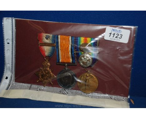 A set of WWl medals including 1914 Star and Bar Trio with a brooched Royal Welsh Fusiliers Button, awarded to 10409 W.A. Davi