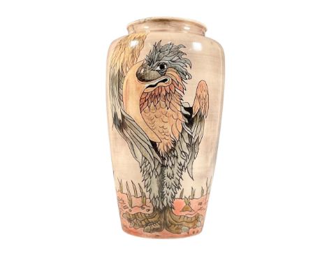 Glazed stoneware, after Martin Brothers. Depicts encircling scene of grotesque birds. Exquisitely designed with finely detail