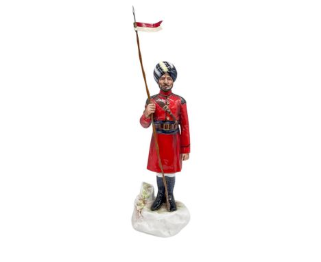 Hand modelled and hand painted porcelain military figure. Red, blue, yellow, gray, green, brown, black, and white glaze color