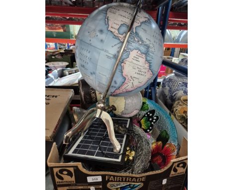A mixed box to include 2 globes, small solar panel, barometer, milk churn and a large glass platter etc