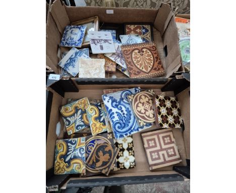 2 boxes of vintage ceramic tiles, various patterns including geometric and blue and white. Named tiles include W Godwin, Here