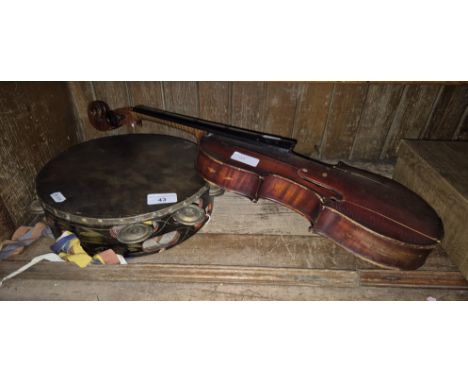 A violin (AF) and a vintage morris dancing tambourine. 