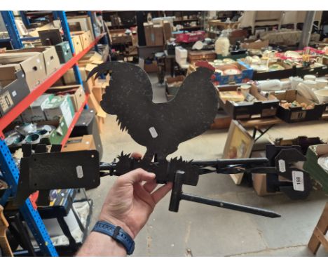 A metal weather vane with cockerel finial. 