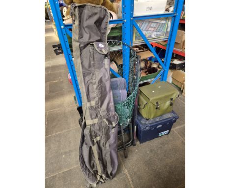 A bag of fishing rods, nets, umbrella, tackle box etc