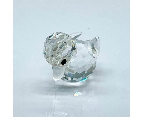 Multifaceted clear crystal mini-duck with black eyes and a frosted beak. Swarovski etched backstamp. This item has its origin