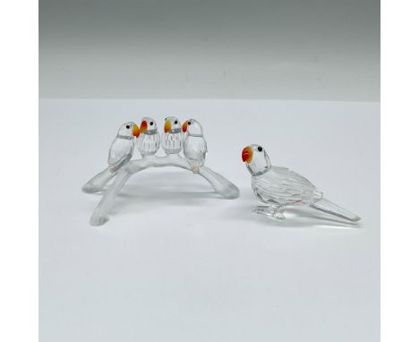Part of the Feathered Beauties collection. Includes a parrot with clear crystal with fire opal beak, and a four birds on a th