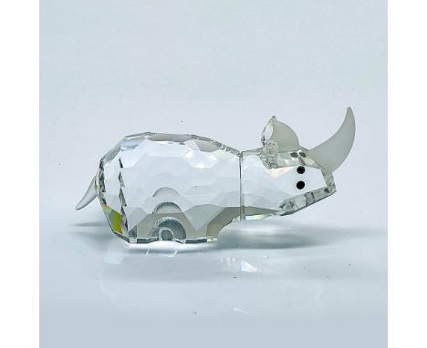 Multifaceted clear crystal rhinoceros, with black eyes, and frosted horns and tail. Part of the African Wildlife group. This 