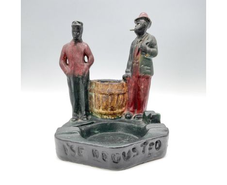 Black Americana ceramic ashtray with a matchbook holder, with inscription I'se Recusted along the base. Issued: 20th centuryD