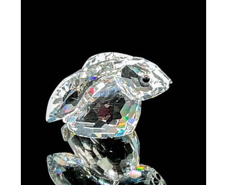 Clear faceted crystal figure of a rabbit with extra long ears. Swarovski mark. Item number 7678NR000001. Part of the In a Sum