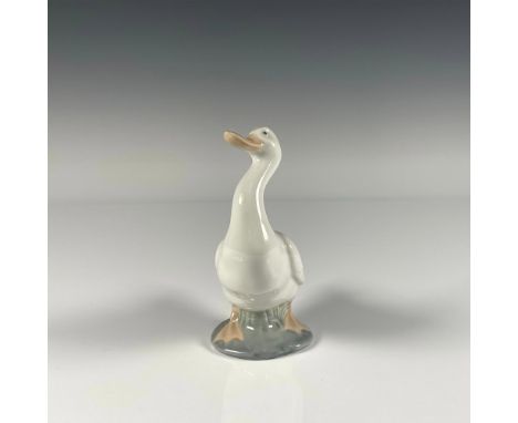 Glossy finish figure of a cute little duck standing. Nao by Lladro backstamp. Artist: Jose RoigIssued: 1992Dimensions: 2.75"L
