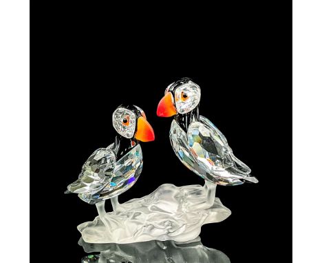 Clear faceted crystal figure of two puffin birds with red/orange beaks and black crystal on face, head and back of body, perc