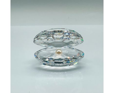 Part of the Aquatic Worlds collection. A stunning sparkling open clam shell revealing a white pearl. Swarovski marked. Issued