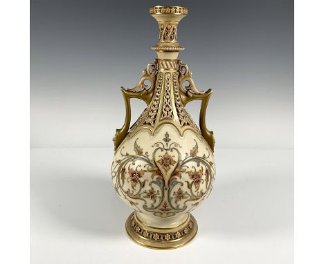 Hand painted porcelain vase with a symmetrical floral pattern trimmed of raised gilding. The upper and mid-neck section, and 