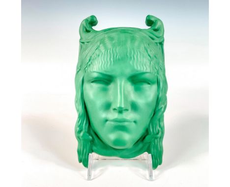 Limited edition, ceramic in matte green glaze modeled as a head of a female, her hair entwined with serpents, flanked by two 