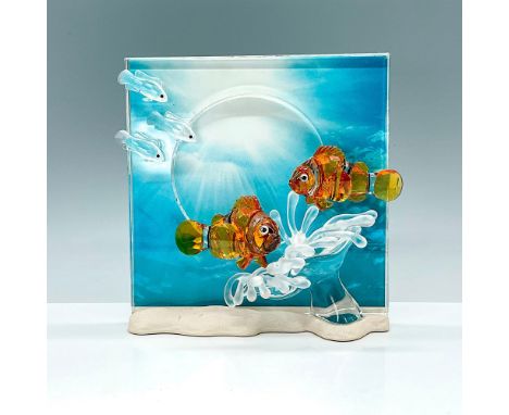 This Harmony Swarovski Crystal is part of the Wonders of the Sea trilogy. Orange colored Clownfish over a frosted sea anemone