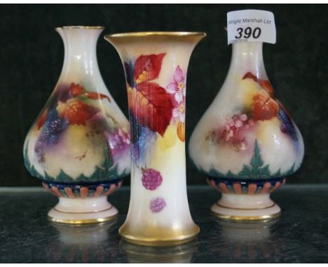 A pair of Royal Worcester Hadley ware vases of baluster form also a Royal Worcester trumpet form vase decorated in the berry 