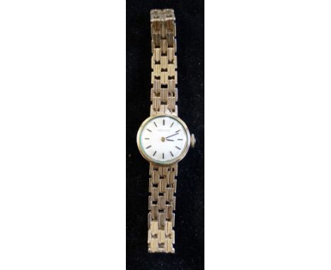 Tissot: A ladies 9ct gold bracelet watch, with fancy link straps, weight including movement 18.5g 
