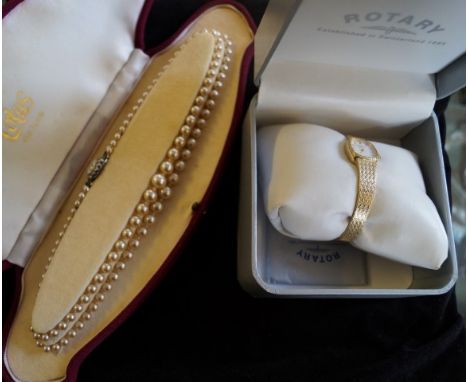 Rotary: A Ladies wristwatch, together with, a double string of Lotus pearls (2) 
