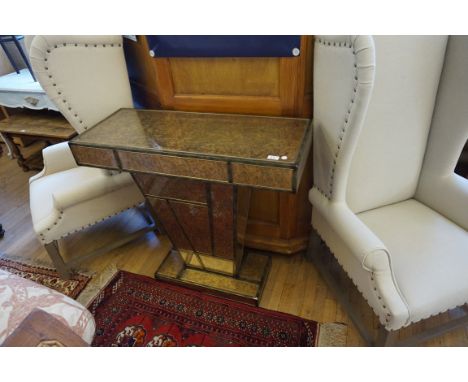 A highly decorative gilt and green finish mirror console table, having floral decoration throughout.