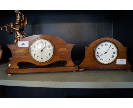 An Edwardian inlaid mahogany mantel clock together with a similar example.