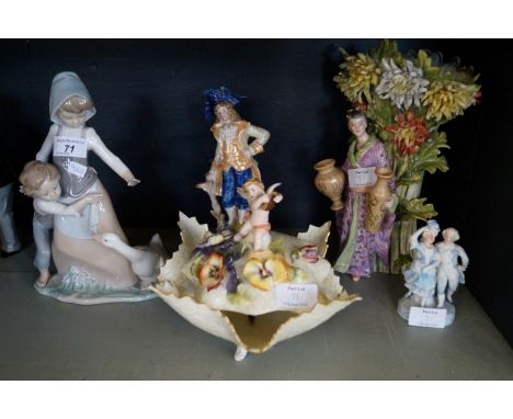 A Lladro figure depicting a girl with a swan, together with continental ceramics, geisha girl holding two vases, beside flora