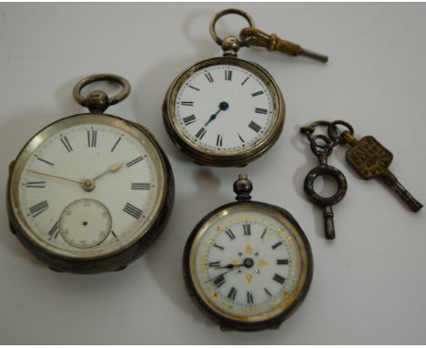 A Victorian silver cased open faced pocket watch having an enamel dial with Roman numerals and subsidiary seconds dial togeth
