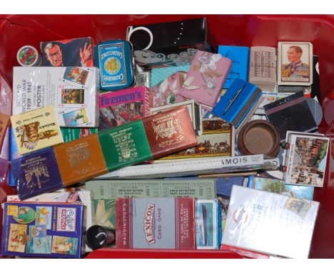 A box of assorted playing cards, matchboxes etc 