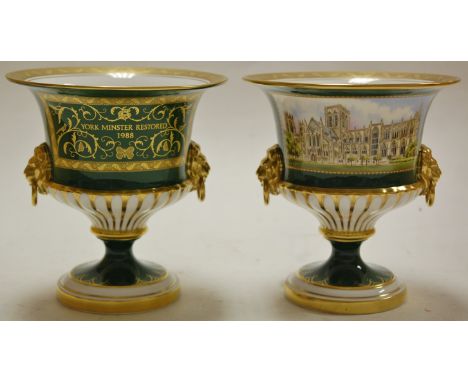 Two Royal Worcester campagne shaped urns to commemorate the restoration of York Minster following the Great Fire of the 9th J