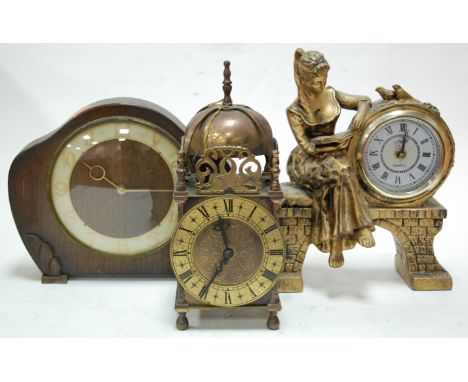 A Smiths brass cased lantern clock together with a Smiths oak cased mantel clock and one other modern figural mantel clock (3