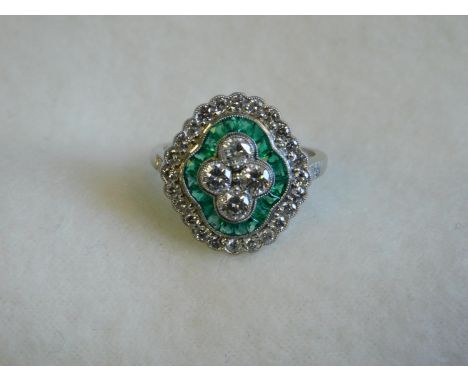 Platinum ring with diamonds and emeralds-size N 