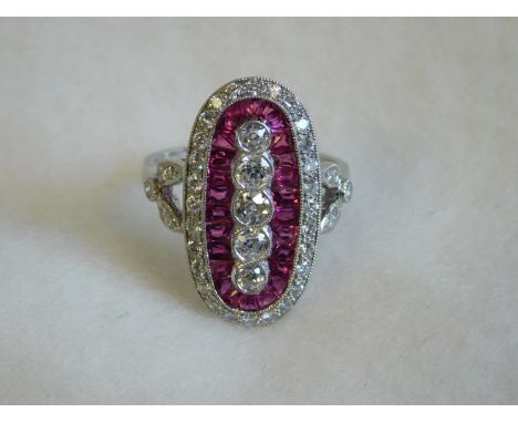 Platinum oval shaped ruby and diamond ring-size N 