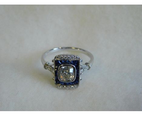 18ct white gold art deco style sapphire and diamond ring -the central old cut diamond is 0.9ct -size N