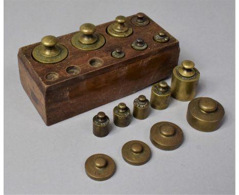 A Wooden Block Housing Metric Scale Weights etc 