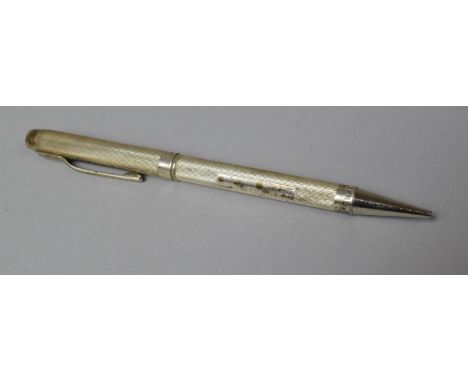 A Silver Cased Propelling Pencil with Engine Turned Decoration 